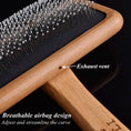 Load image into Gallery viewer, Comfortable grip detail on MeowShelf Kanso solid bamboo cat hair brush.