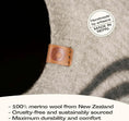 Load image into Gallery viewer, Merino Cocoon wool cat cave artisan label — handcrafted quality leather accent, felted cat bed