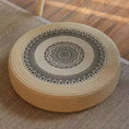 Load image into Gallery viewer, Tatami Zen Pouf in woven straw, elevated side view of the ornate circular embroidery, a unique cat bed.