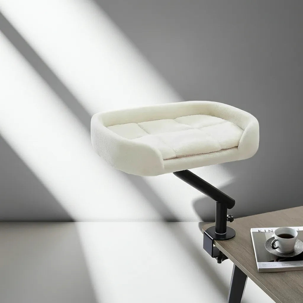 360 Rotating Cat Desk Bed in plush white, side perspective view of the plush dual-sided cushion, washable cat bed pads.