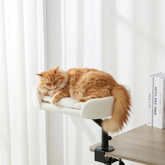 360 Rotating Cat Desk Bed in plush white, side perspective view of the plush dual-sided cushion, washable cat bed pads.
