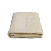 Cloudsoft Waffle-Weave in Coral Fleece, product shot folded layered top view of layered waffle fold, a cat blanket for sofa protection.
