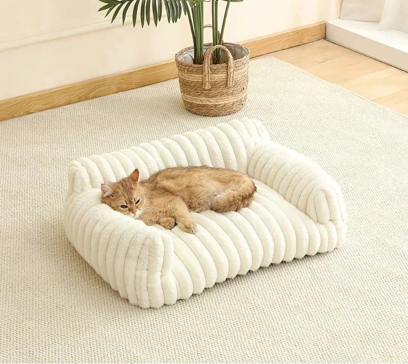 Cloud Corduroy Ribbed Plush Cat Bed, three-quarter view of the elevated edge design, a cozy cat nest.