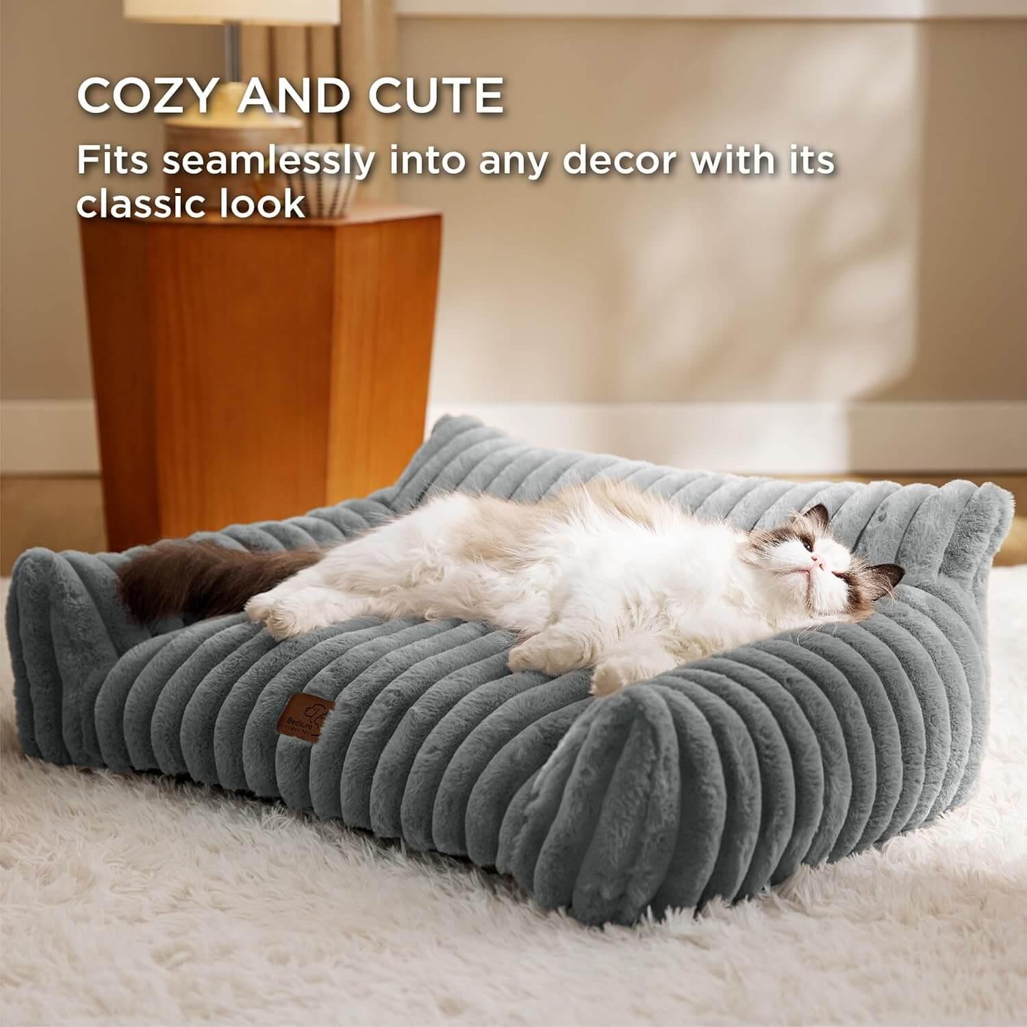 Cloud Corduroy Ribbed Plush Cat Bed, angled top view of the luxury relaxing posture, a luxury cat lounger.