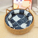 Natural Woven Cat Ear Bed in cattail, angled top view of the organic texture, a hand-woven cat basket for boho decor.
