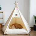 Load image into Gallery viewer, Nomad Nook Boho-Chic in canvas fabric and natural wood, side view with plush cushion and tied top, a cute cat bed.
