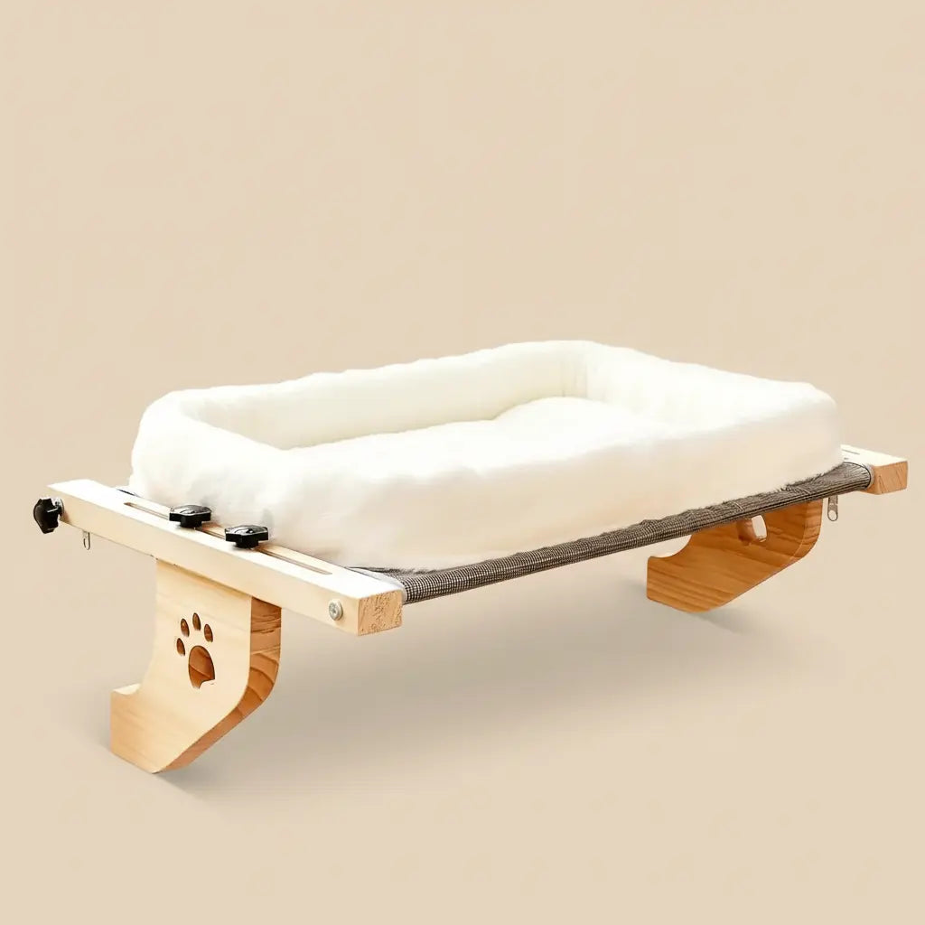 Modern solid wood cat window perch with a plush white bed, product packshot.