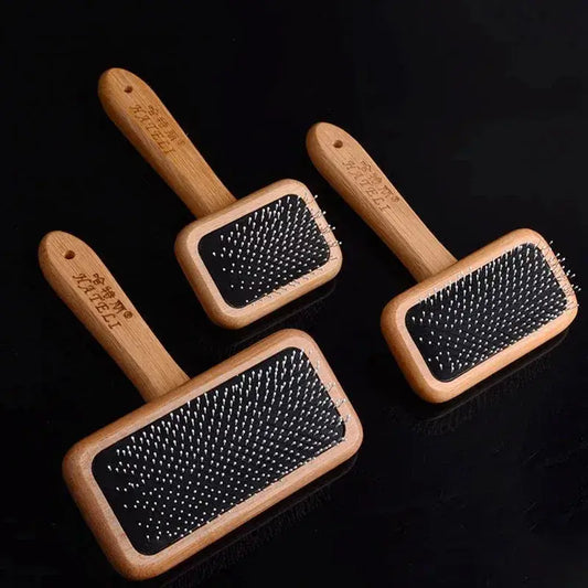 MeowShelf Kanso ergonomic bamboo cat brush with breathable massage cushion.