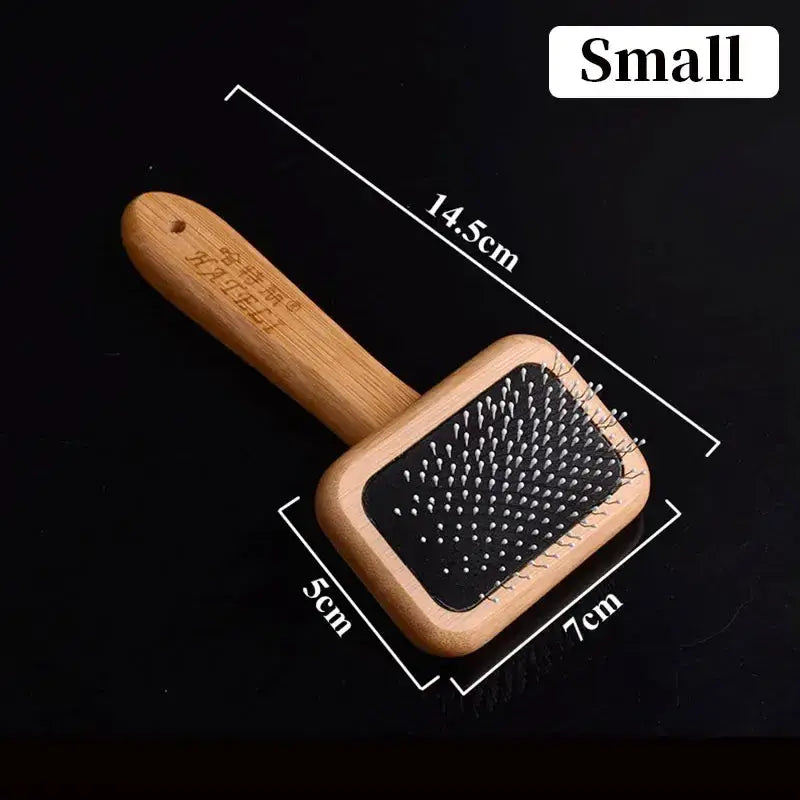 Gentle bristles removing loose undercoat on MeowShelf Kanso cat brush.