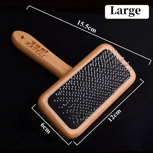 Close-up of breathable pin cushion on MeowShelf Kanso bamboo cat brush.