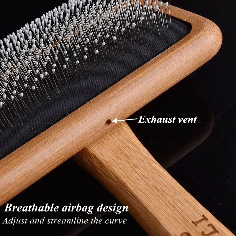 Comfortable grip detail on MeowShelf Kanso solid bamboo cat hair brush.