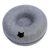 Sleek minimalist stone shape of MeowShelf Pebble scratch-resistant cat cave.