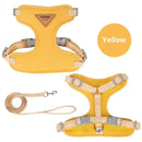 Yellow Lumina escape-proof cat harness and matching leash set displayed flat against a white background.