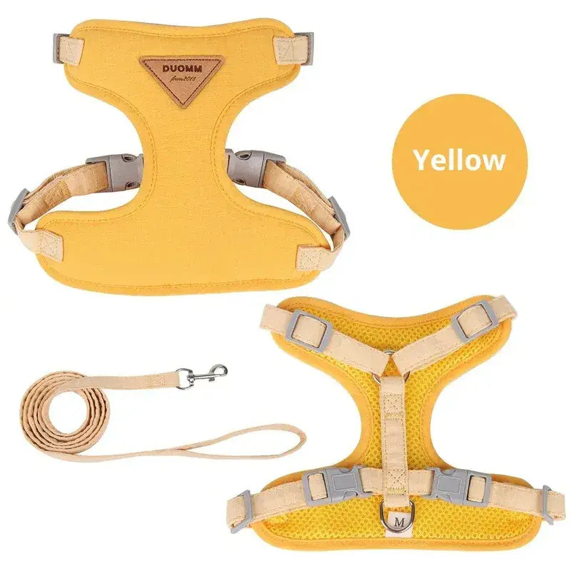 Yellow Lumina escape-proof cat harness and matching leash set displayed flat against a white background.