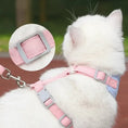 Load image into Gallery viewer, Close-up of the adjustable buckle on the Lumina cat harness, ensuring a secure and custom fit on a white cat.
