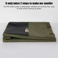 Load image into Gallery viewer, The flexible Alpine Olive green cat carrier tote folded flat for easy apartment storage.
