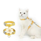 Cat relaxing in backyard wearing comfortable MeowShelf Petal Stroll harness.