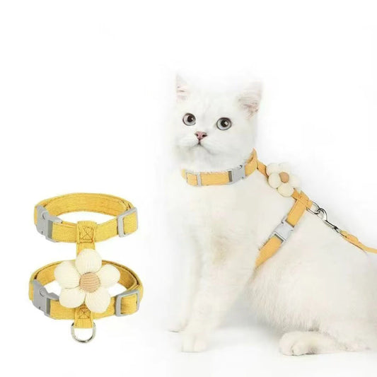 Cat relaxing in backyard wearing comfortable MeowShelf Petal Stroll harness.