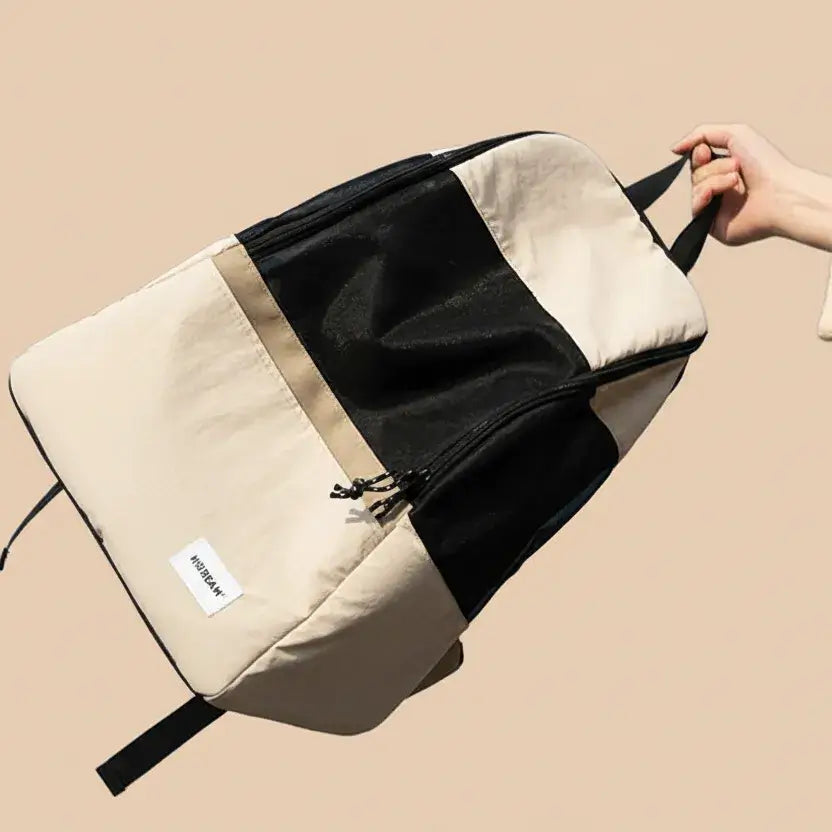 MeowShelf Roamer breathable minimalist canvas cat travel backpack.
