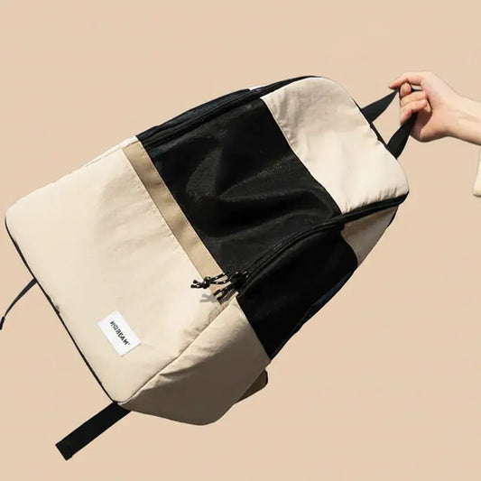 MeowShelf Roamer breathable minimalist canvas cat travel backpack.
