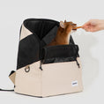 Load image into Gallery viewer, Front expansive mesh window on MeowShelf Roamer lightweight cat carrier.
