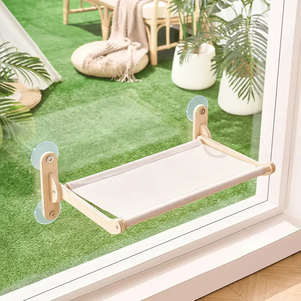 Floating cat window seat with natural wood finish — apartment-friendly no-drill design