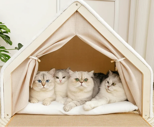 Wooden Cat Villa Tent in solid wood and hemp, straight on view of the cozy interior with cats, cat furniture for multiple cats.