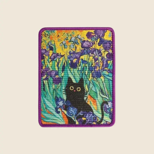 The Gallery cat wall scratcher in Violet Iris, purple iris field sisal board with black cat