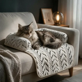 Load image into Gallery viewer, Tabby cat lounging on The Sumi Lounger plush cat bed with bolsters on a sofa in a cozy evening room
