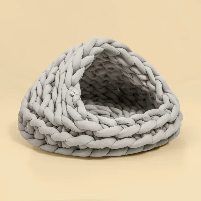 Chunky Knit Cocoon Cat Cave in ultra-thick hand-woven yarn, product shot of the backside showing the cozy folded knit edge.