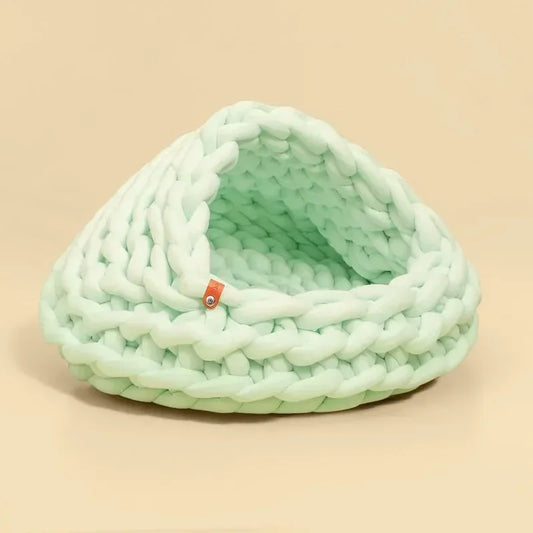 Chunky Knit Cocoon Cat Cave in ultra-thick hand-woven yarn, upper rear view highlighting the airy knit texture for breathability.