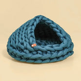 Chunky Knit Cocoon Cat Cave in ultra-thick hand-woven yarn, product shot angled top view of textured knit pattern, a soft cat bed.