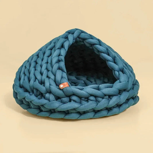 Chunky Knit Cocoon Cat Cave in ultra-thick hand-woven yarn, product shot angled top view of textured knit pattern, a soft cat bed.