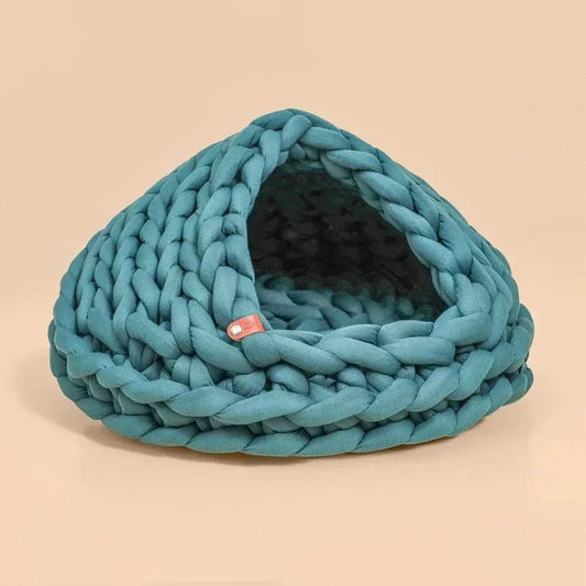 Chunky Knit Cocoon Cat Cave in ultra-thick hand-woven yarn, front top view of the broad interwoven pattern, a piece of modern fiber art.