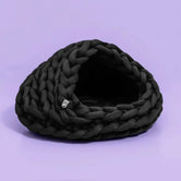 Chunky Knit Cocoon Cat Cave in ultra-thick hand-woven yarn, product shot side detail shot of minimalist chunky weave, minimalist pet furniture.