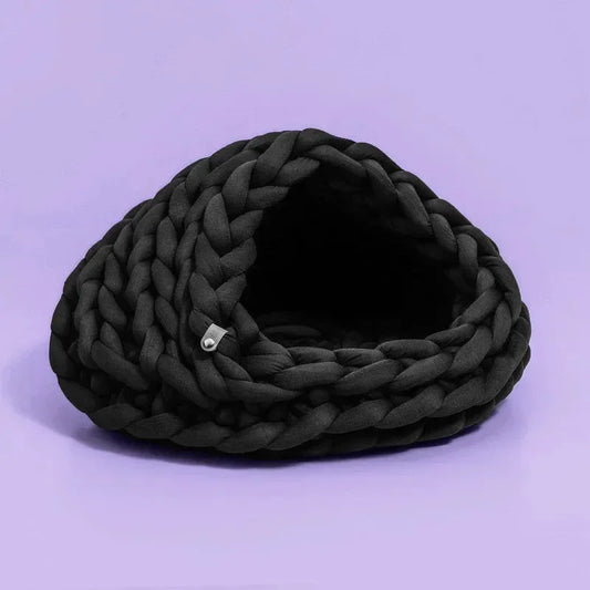 Chunky Knit Cocoon Cat Cave in ultra-thick hand-woven yarn, product shot side detail shot of minimalist chunky weave, minimalist pet furniture.
