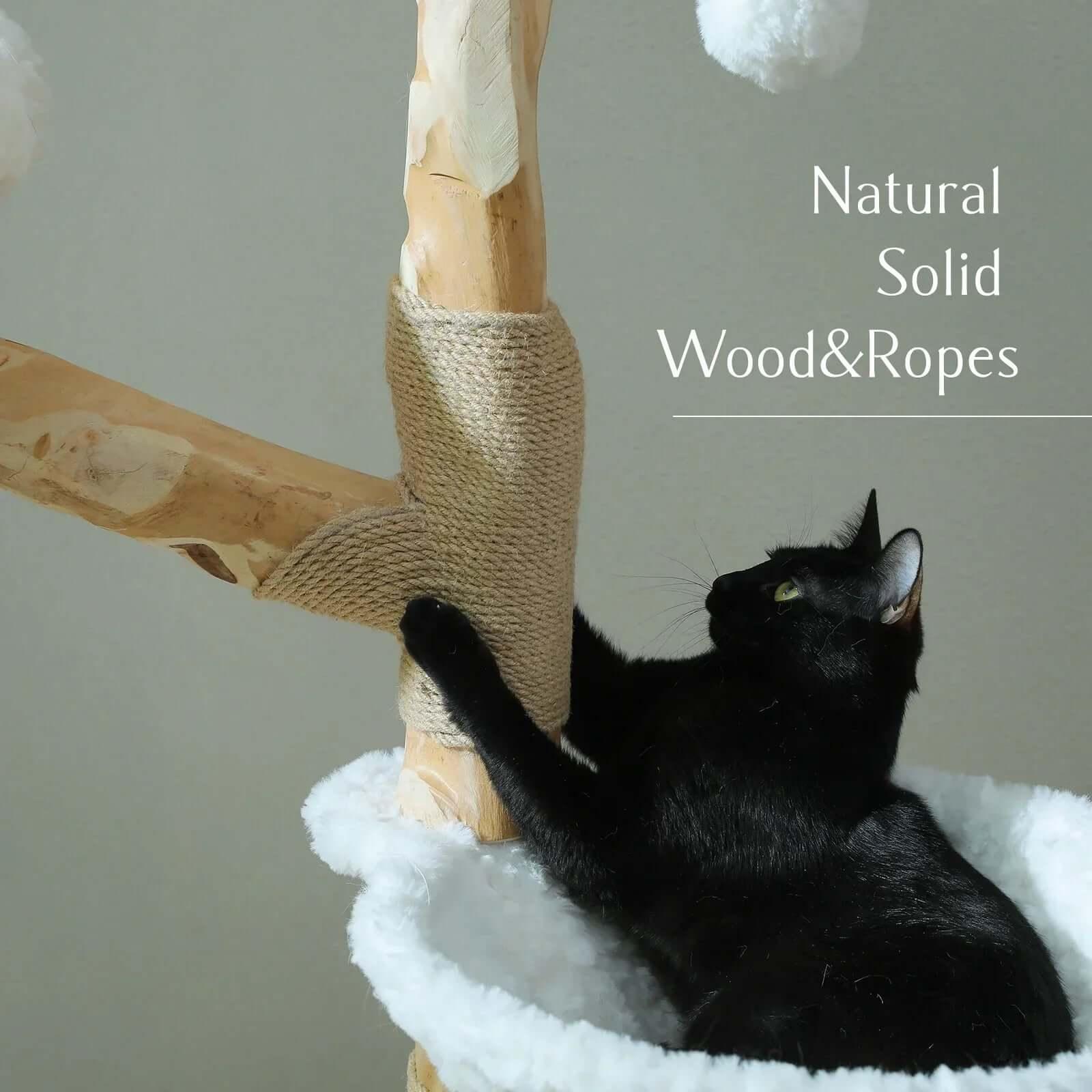 Cloud Forest Cat Tree in natural real wood and white plush, diagonal focus on wood trunk with rope, a real wood cat tree for scratching.