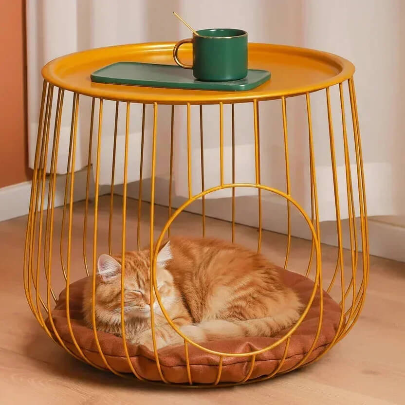 Gilded Lounge cat bed side table in home — gold wireframe, clever cat furniture for small apartments