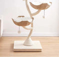 Load image into Gallery viewer, Lotus Tower Japandi Flower Cat Tree, close-up view of double pom toys on a luxury cat tree with play value.
