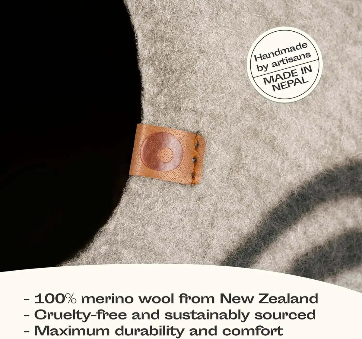 Merino Cocoon wool cat cave artisan label — handcrafted quality leather accent, felted cat bed