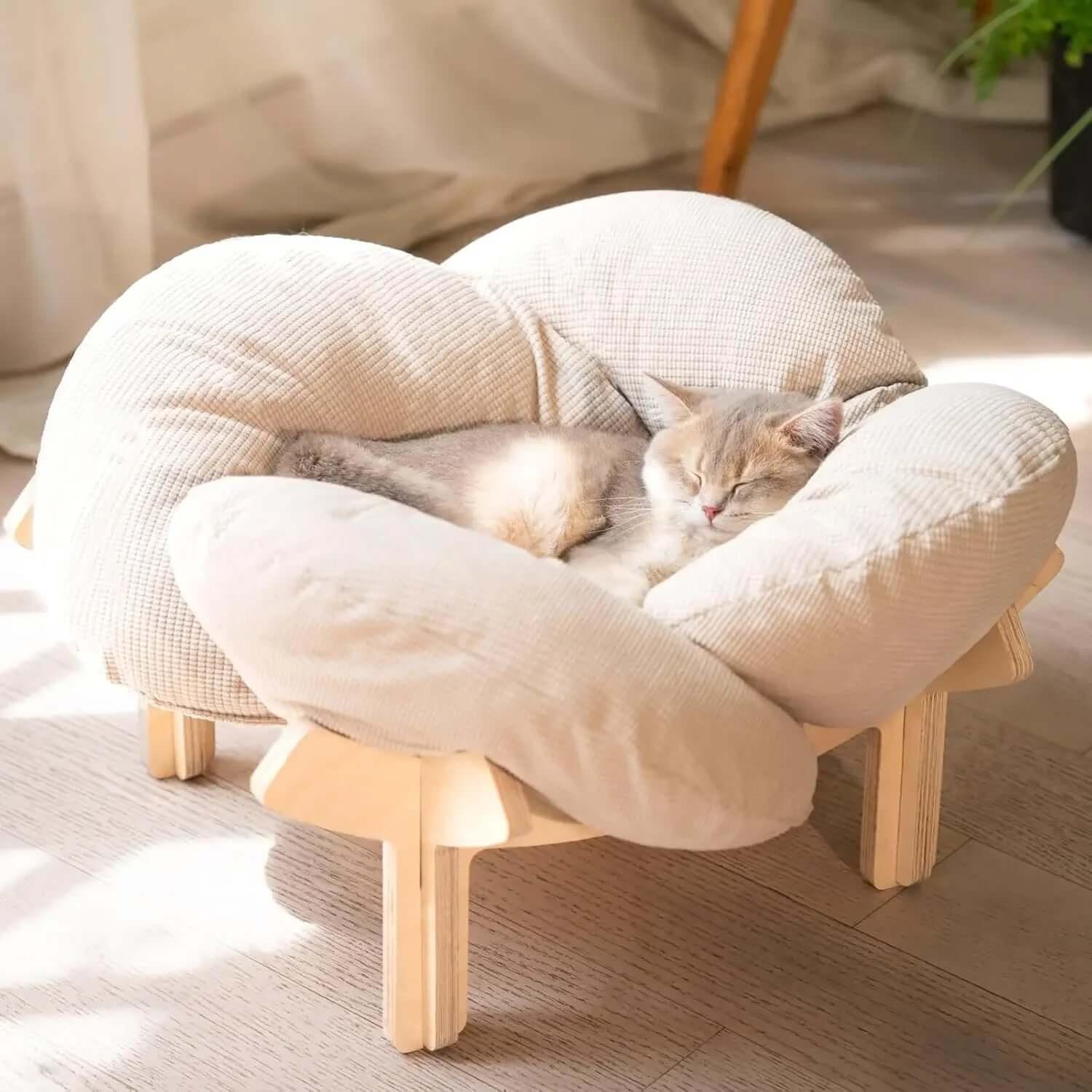 Nimbus Elevated Lounge with fluffy cloud cat bed on wood stand, side view of the soft cloud cushion.