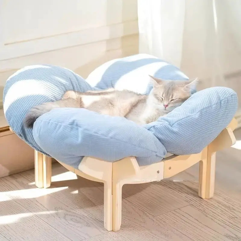 cat-relaxing-in-sky-blue-fluffy-elevated-cat-bed-wood-stand