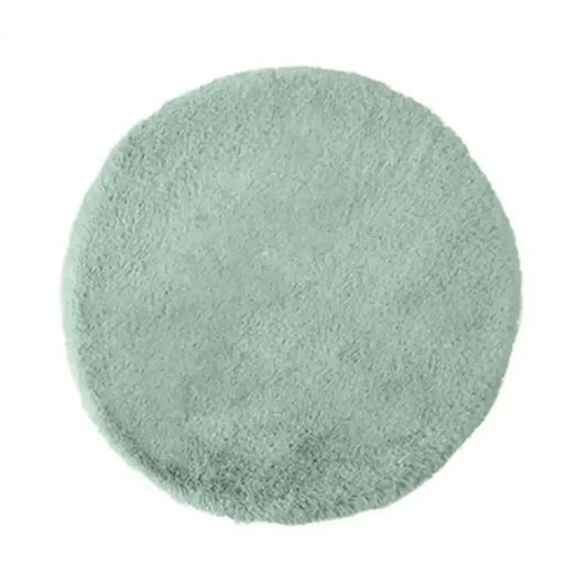 Plush Refresh Round Faux Fur Replacement Cushion, straight-on view of the smooth texture and tranquil hue.