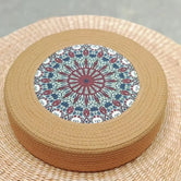 Natural straw woven cat cooling mat in Black Ink Lotus — kaleidoscope embroidery, Japandi cat bed