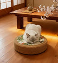 Load image into Gallery viewer, Tatami Zen Pouf in woven straw, room corner view of the botanical woven top, natural cat furniture.
